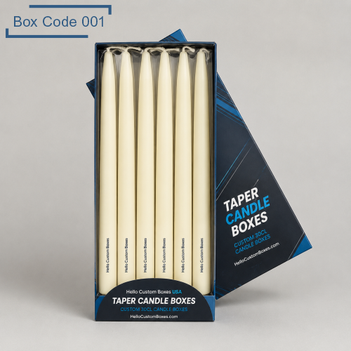 Black and blue taper candle boxes with a clear window, holding six white taper candles. Designed for elegant retail display and gift presentation.