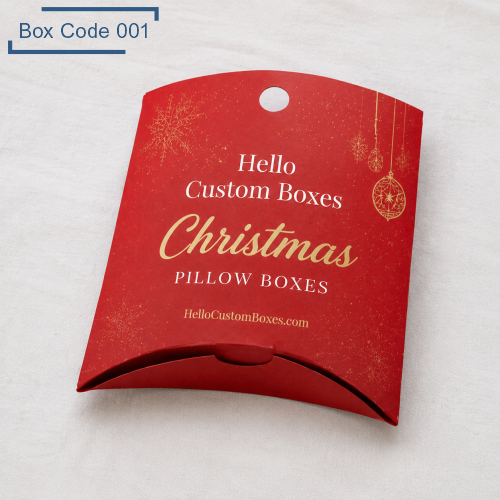 Red Christmas Pillow Boxes for gift ornament design, branded “Hello Custom Boxes Christmas Pillow Boxes”, top hole for hanging or display.